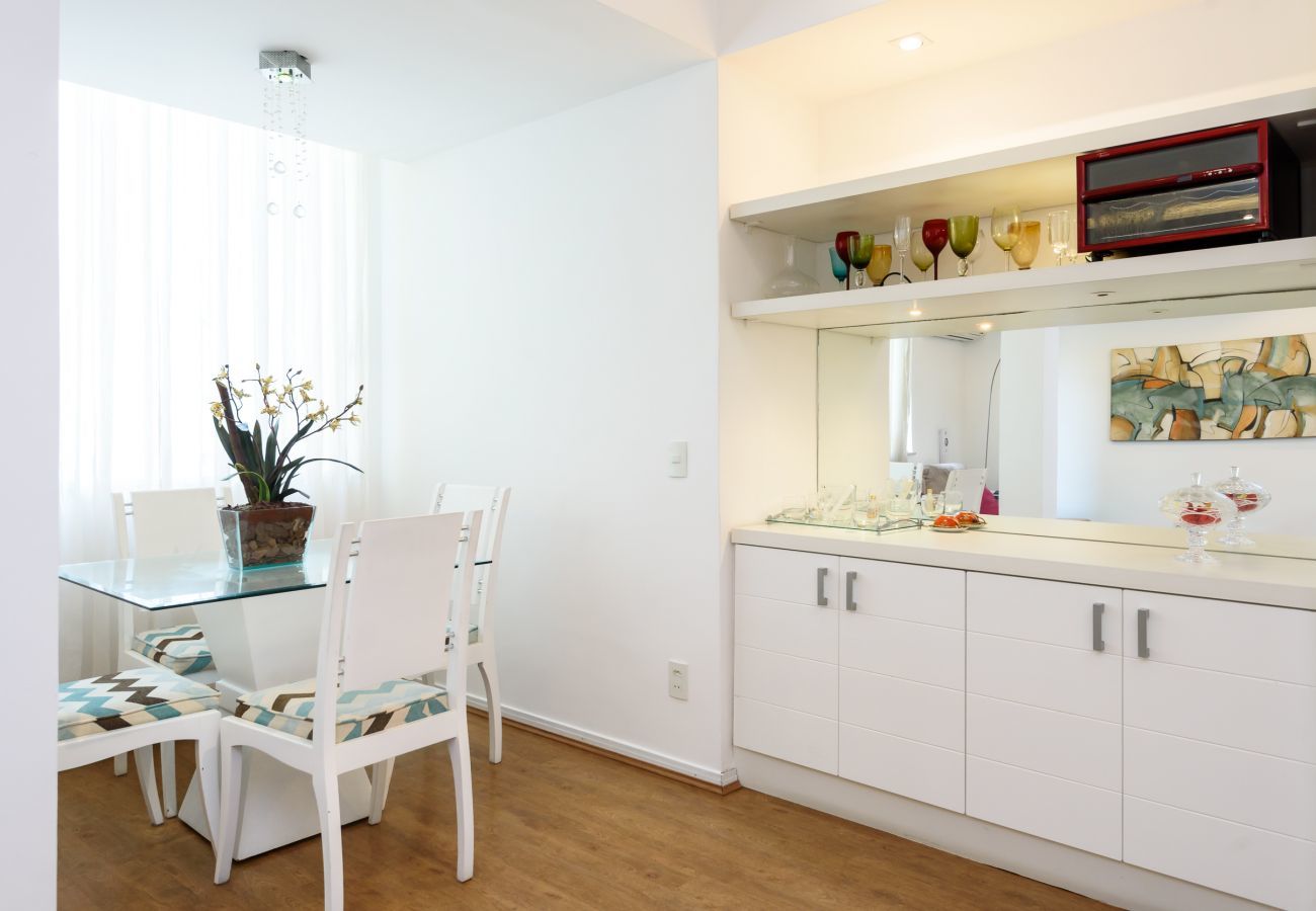 Dining room with table for meals.