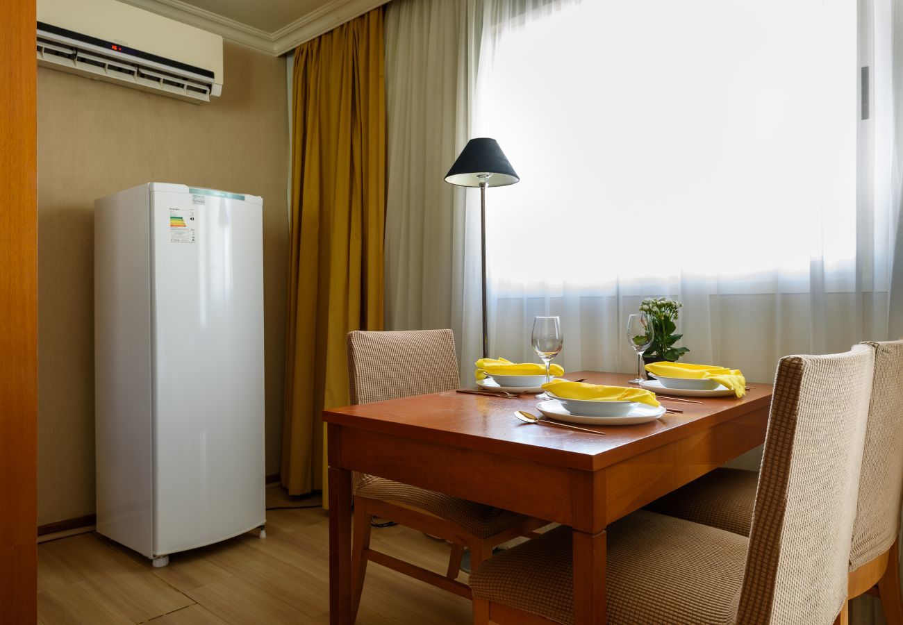 Dining area with table for meals.