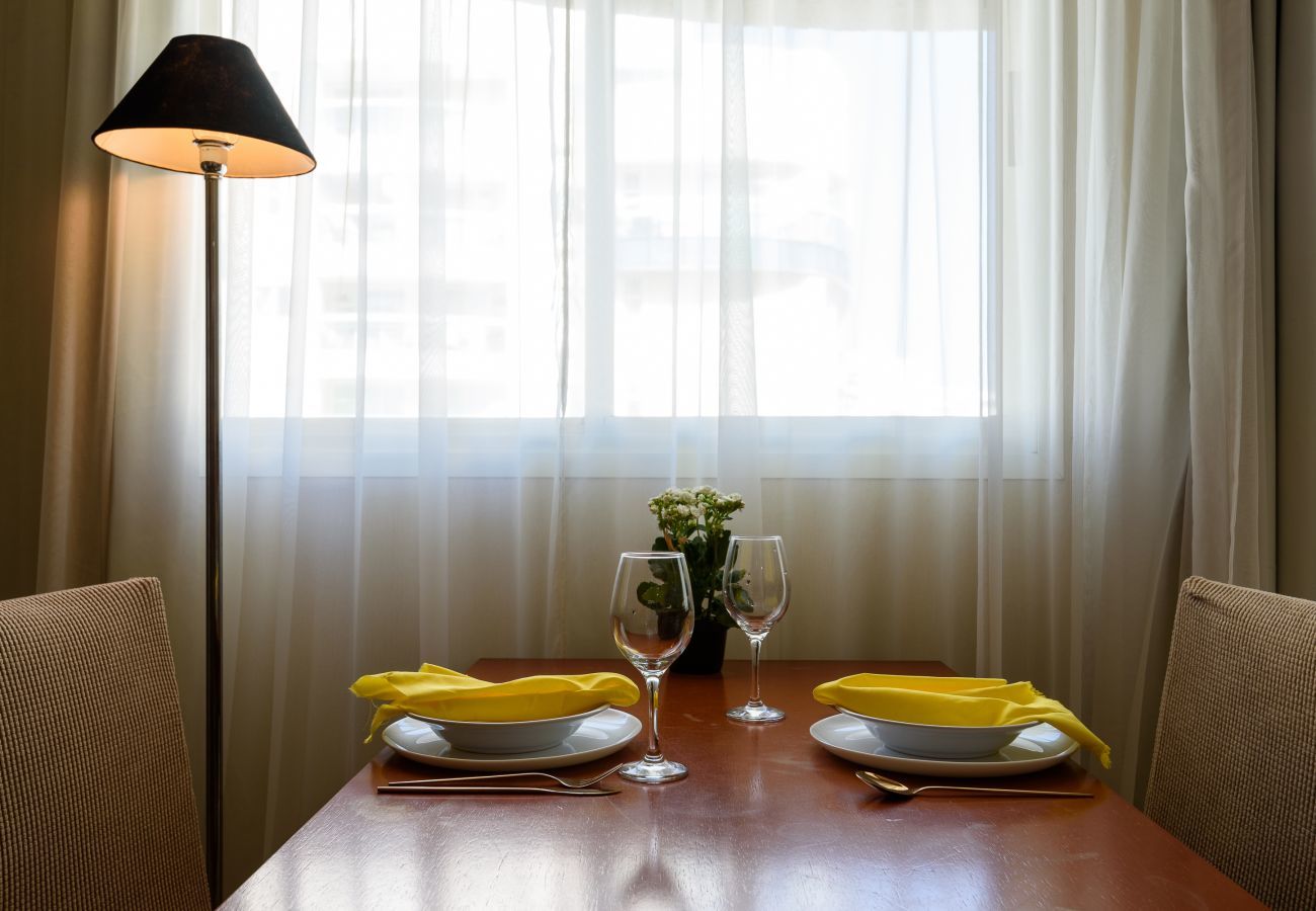 Dining area with table for meals.